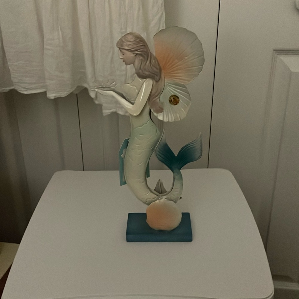 Mermaid metal statue